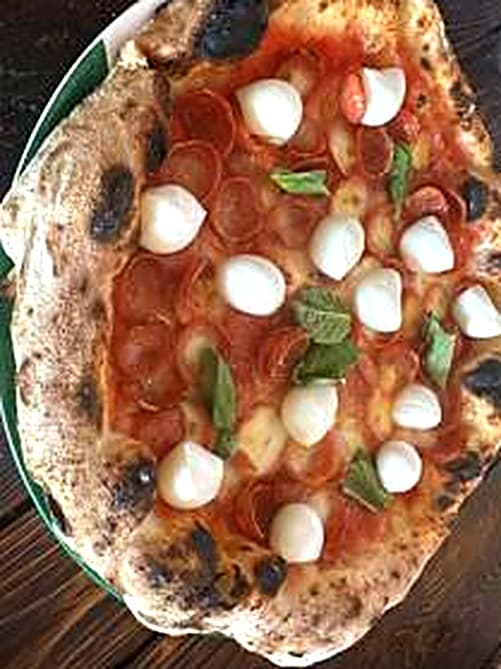 Pizza with fresh mozzarella pearls and pepperoni