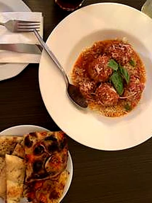 Meatballs in tomato sauce with basil