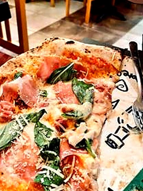 A fresh slice of wood-fired pizza